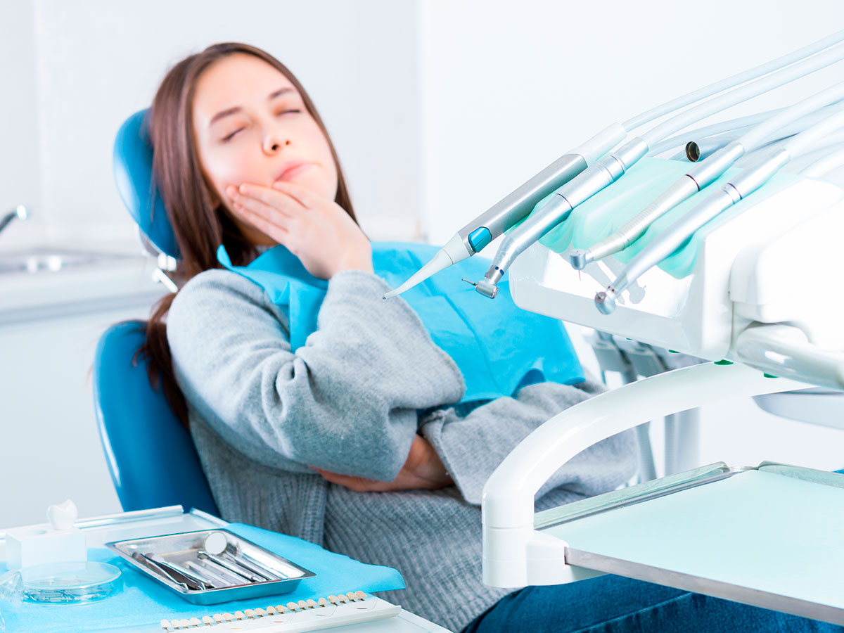 Woman With Wisdom Teeth Pain Ready For A Wisdom Tooth Removal In New York